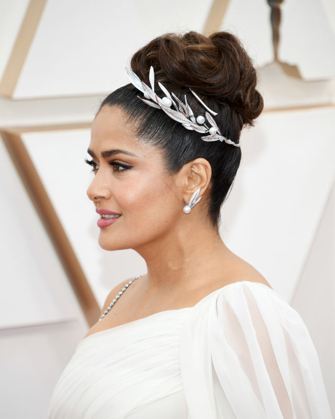 Salva Hayek wearing pearl diamond earrings and a pave diamond necklace transformed into a diamond tiara at the 2020 Oscars
