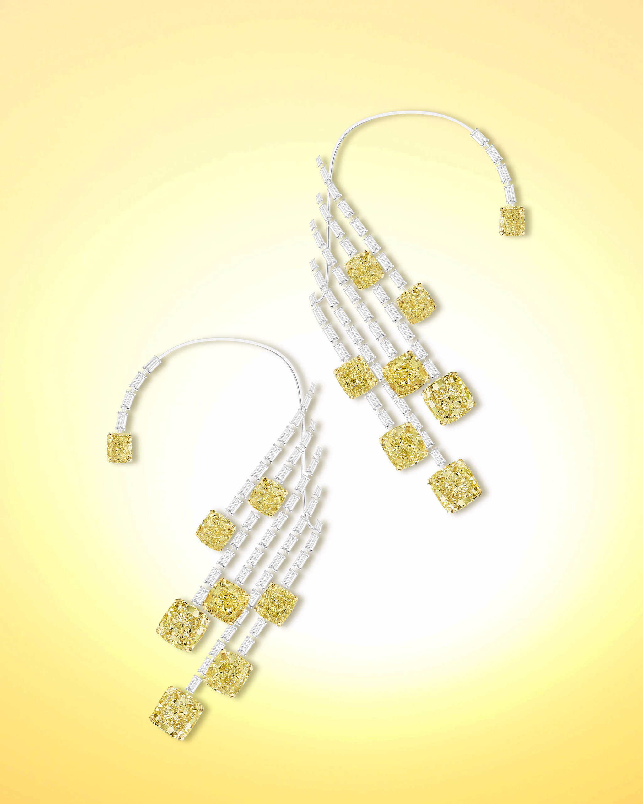 The Fire Diamond statement earrings: 8 cushion cut yellow diamonds extended from linear baguette diamonds from Messika