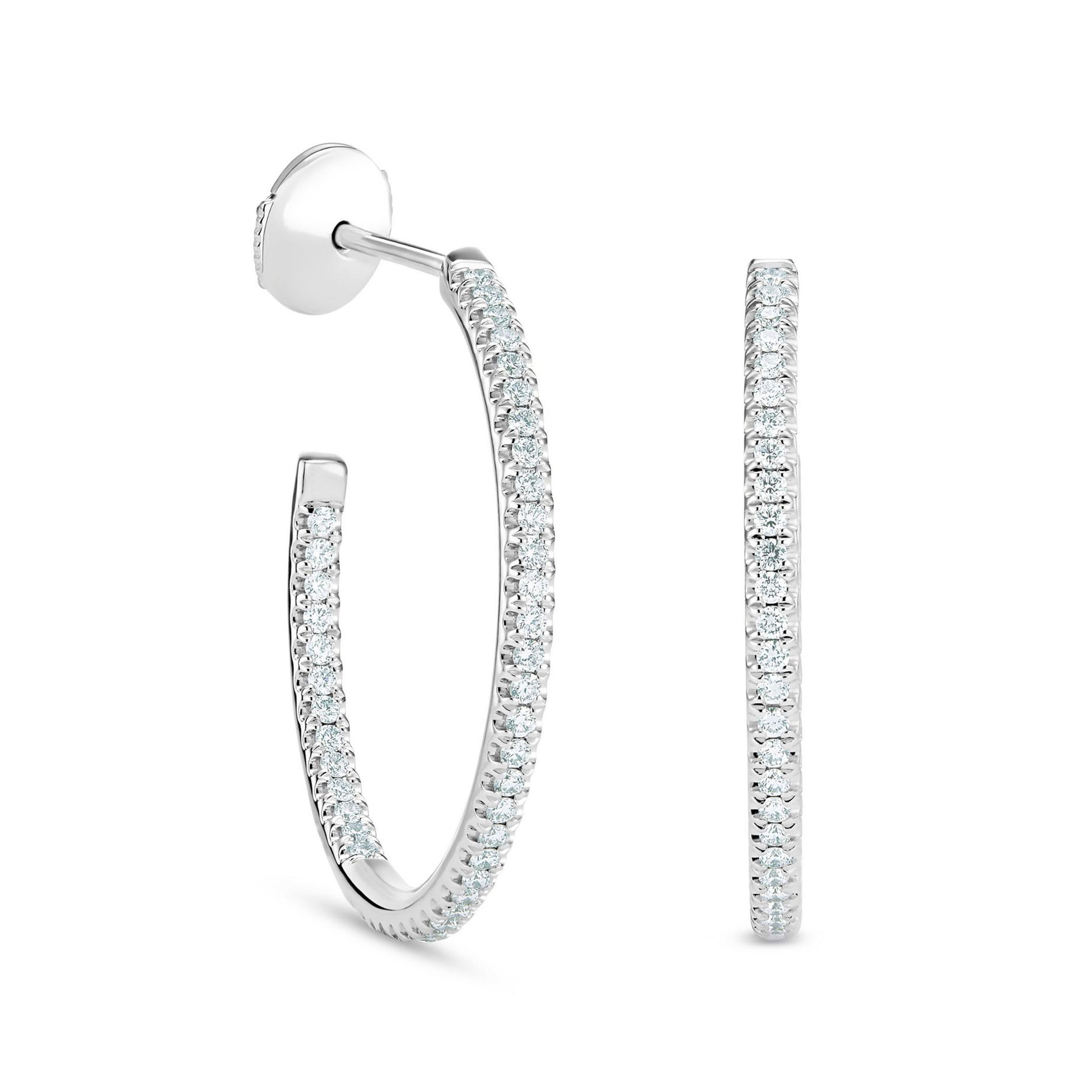 Boucles d’oreilles DB  en or blanc et diamant